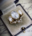 Macro shot of vintage gold wedding ring set with rose cut diamonds and V-shaped band - Cy737 / Size 5