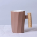 Nordic pink-brown ceramic mug with wooden handle and textured polygonal design - Decagonal Khaki Mug