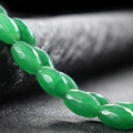 Strand of polished green natural jadeite beads in oval shape for DIY jewelry making - Malay Jade Faceted