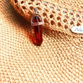 Polished hexagonal red agate crystal pendant necklace with silver metal clasp - Smoky Quartz