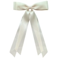 Detail of white satin ribbon bow hair clip with smooth texture and long elegant streamers - Beige