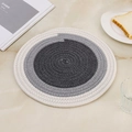 Handwoven circular cotton placemat with grey and beige gradient spiral pattern - Gradient
