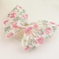 Detail view of 14cm butterfly hair claw clip with pink floral patterns and hollow design - Pink and Green