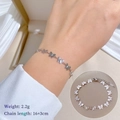 Détail du bracelet chaîne papillon argenté montrant la longueur 16+3cm et le poids 2,2g - Argenté