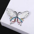 Enamel butterfly brooch with colorful crystals and pearl on a premium display stand - White