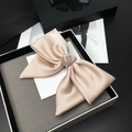 Elegant champagne satin oversized bow hair clip presented in a premium gift box - Satin Bow / Premium Beige