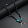 Bohemian lava stone and turquoise beaded necklace with a silver crescent moon pendant - Turquoise