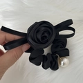 Detail of black satin scrunchie with a fabric rose, ribbon bow, and white pearl charm - Rose Pearl Ribbon Style / Black