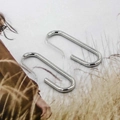 Minimalist silver geometric U-shaped brass earrings on stylish magazine background - Silver