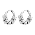 Macro detail of silver stainless steel hoop earrings with vintage hollow dragon totems - Twisted Dragon Pattern Bead (MS-653A) / Steel