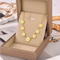 Elegant gold titanium steel necklace with seven small daisy charms in a luxury gift box - Necklace / Gold