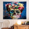 Artistic Frida Kahlo sugar skull wall tapestry with floral crown and starry blue background - Mexican Folk Art Sugar Skull