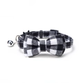 Detail of British plaid bow pet collar with silver bell and fabric texture display - Bowknot Style / Black