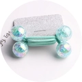 Detail of green elastic hair ties featuring glittery transparent resin beads on a silver card - Mint Green