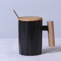 Matte black ceramic mug with wooden handle, wood lid and golden spoon on white cloth - Diamond Pattern Black Mug with Lid & Spoon