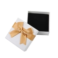 Elegant white square jewelry gift box with a gold satin bow and soft black velvet lining - Tote Bag / Champagne