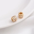 Detailed macro view of 14K gold-plated spacer beads with micro-set zircon crystals - Style 11 / 8x7mm / 14K Gold