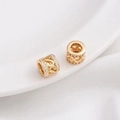 Macro detail of 14K gold plated hollow filigree beads with micro-set zircon stones - Style 12 / 8x7mm / 14K Gold