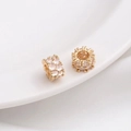 Macro detail of 14K gold-plated wheel spacers with micro-set cubic zirconia stones - Style 14 / 8x5mm / 14K Gold