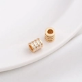 Macro shot of 14K gold plated bead spacer with three rows of micro-inlaid cubic zirconia - Style 10 / 6.5x6mm / 14K Gold