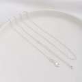 Detail of 14K gold plated necklace with lobster clasp, extender chain and teardrop pendant - Flat Cable Chain / Thick Silver Plated