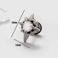 Macro view of men's stainless steel stud earring with star-shaped thorns and cubic zirconia - Starburst Thorn Style (S65)