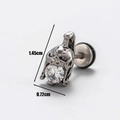Macro shot of stainless steel earring featuring skull helmet design and cubic zirconia - Gothic Helmet Mask Style (S67)