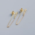Detailed macro view of S925 sterling silver hallmark on gold-plated long tassel earrings - Gold