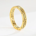 Polished gold titanium steel cuff bracelet featuring a hollow Greek key pattern design - US 5 / Gold