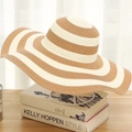 Wide brim beach straw hat featuring a beige and cream white striped woven pattern - One Size (Adult) / Khaki Striped