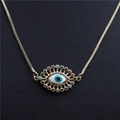Collana dorata con ciondolo Occhio del Diavolo in zirconi e cristalli colorati - 4 Occhi