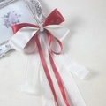 Detailed view of traditional Chinese red and white ribbon hair bow with pearls and long streamers - Wine Red and Beige