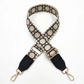 Close-up of houndstooth bag strap with premium black leather and gold metal clips - Beige Mesh