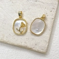 Macro shot of 14k gold-filled mother of pearl pendants featuring a carved rose detail - 18K Gold