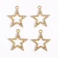 Macro detail of four gold-plated star pendants with pavé-set cubic zirconia stones - Gold Five-pointed Star