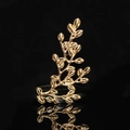 Detail shot of a golden tree branch ring with artistic texture on a black reflective surface - Gold Branch (Right)