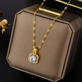 Golden titanium steel necklace with square pendant and sparkling round gemstone on jewelry box - 8983 Gold And White