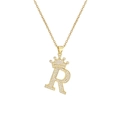 Macro detail of gold plated letter R pendant with crown and micro inlaid zircon stones - Crown Letter R(R)