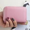 Pink pebbled leather card holder with gold zipper closure and compact design - Pink