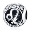 Macro shot of silver Leo zodiac charm with sparkling cubic zirconia for DIY jewelry - Leo