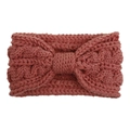 Détails de la maille du bandeau rose à torsades avec un nœud central élégant - Rose Poudré