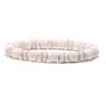 Detail of white lava stone stretch bracelet with round and disc-shaped natural porous beads - Elastic Cord Style / White