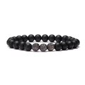Macro shot of matte black beaded bracelet with three sparkling micro-paved zircon balls - 3 Black Zirconia Balls