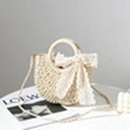 Mini round white woven straw bag with lace bow decoration and a gold chain strap - Beige