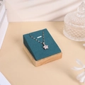 Detail of star pendant necklace with white zircon on a luxury green velvet display stand - 7*8 Pendant Rack / Green Velvet