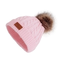 Pink cable knit winter hat for babies with a large brown faux fur pompom and leather label - Hat / Pink