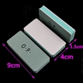 Macro view showing 9x4x1.5cm green and white dual-sided nail buffer blocks - Polishing Block (O.P. Print)
