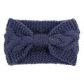 Macro detail of the chunky cable knit texture and bow shape on this dark blue headband - Denim Blue