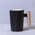 Nordic black faceted ceramic mug with natural wood handle for coffee and milk - Decagonal Black Mug