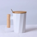 White ceramic mug with wooden handle, matching lid and spoon featuring geometric facets - Decagonal White Mug with Lid & Spoon